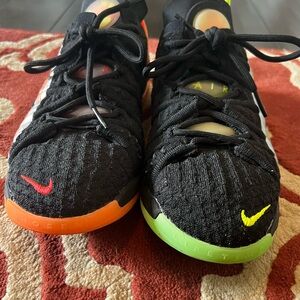 Nike LeBron Kids Basketball Black Sneakers with Orange and Green Accents